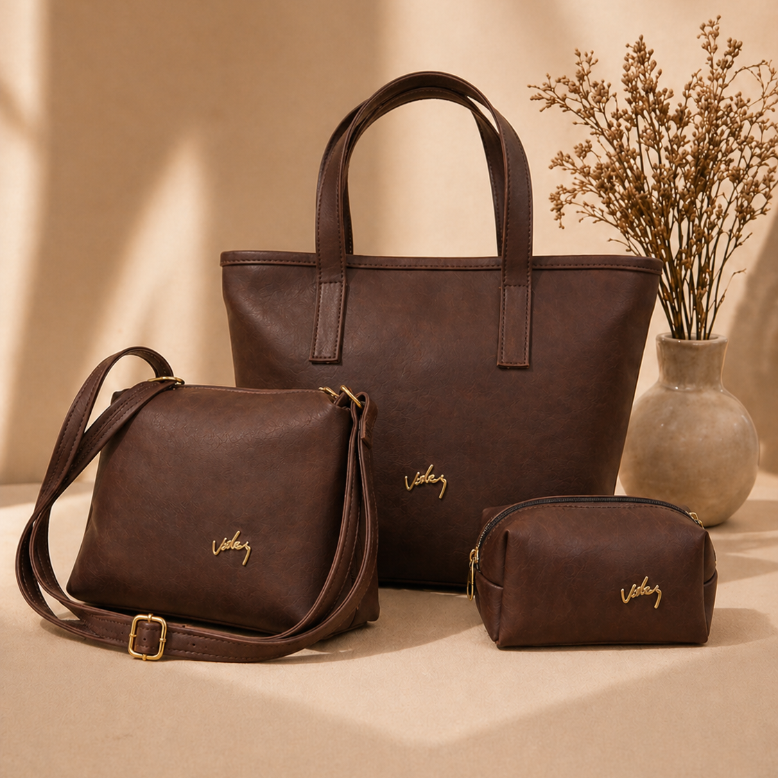 TRÍO DE BOLSOS VÉLEZ CUERO LEGÍTIMO - 60% DE DESCUENTO